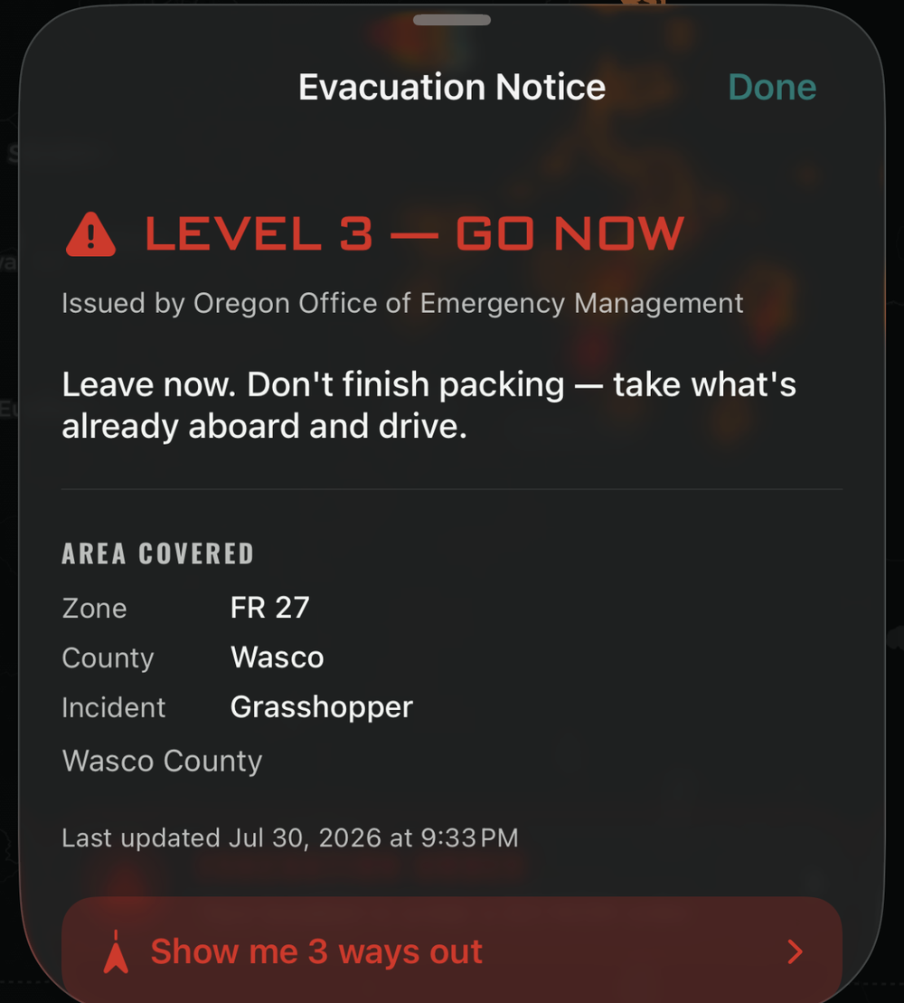 Storm Recon's Evacuation Notice sheet: LEVEL 3 — GO NOW, issued by Oregon Office of Emergency Management, with the instruction to leave now and take what's already aboard, and an area-covered block listing Zone FR 27, Wasco County, incident Grasshopper.